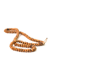 Wooden islamic prayer beads isolated on a white background