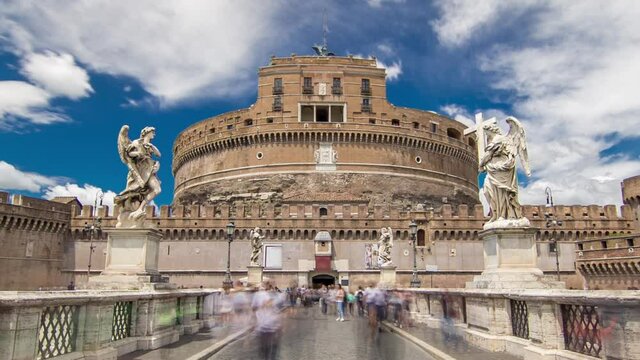 Saint Angel Castle Castel Sant Angelo from bridge Ponte Sant Angelo over the Tiber river timelapse hyperlapse, Rome, Italy. Statue on the side and cloudy sky