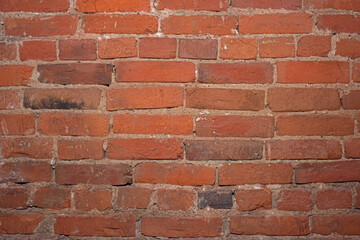 Wall of red rectangular bricks
