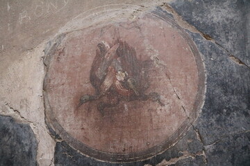 Painting on a house wall in Herculaneum, Italy