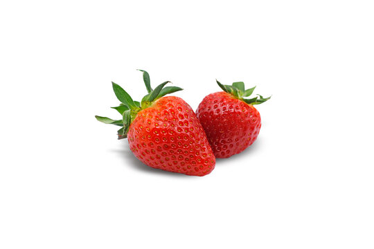 Two fresh strawberries close-up. Isolated image. White background.