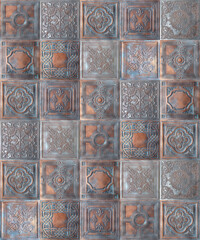 Old decorative painted tin ceiling tiles. Seamless pattern.