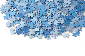 Many jigsaw puzzle pieces on white background.