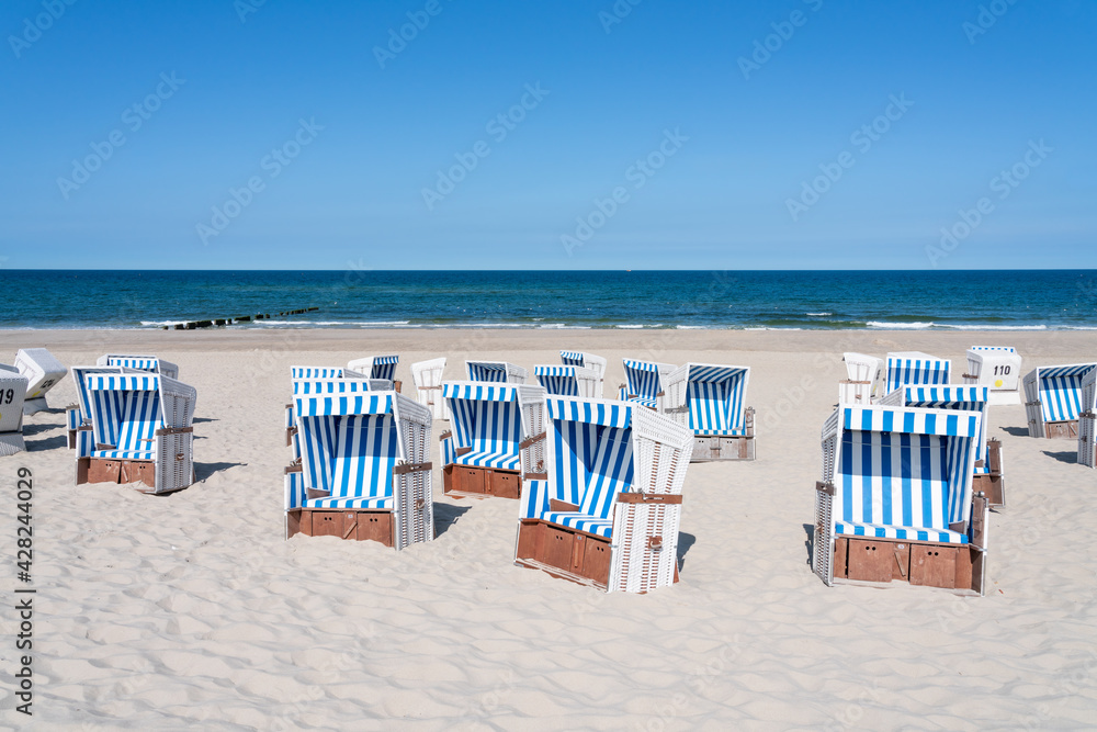 Wall mural empty beach chairs at the north sea coast