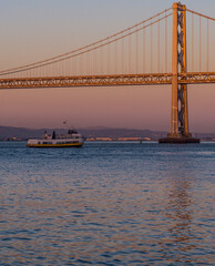 Golden Gate Bridge in San Francisco Bay near Sunset.