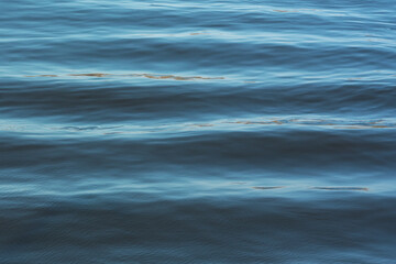 texture of calm waves on blue water