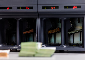 Electronic counter machine in process of counting money