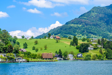 Fototapeta premium Waterview on Swiss village near Lucerne, Switzerland.