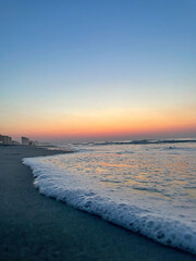 Welcoming wave to the beach