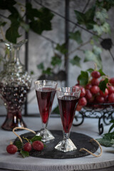 Grape juice in a glass on the table.