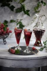 Grape juice in a glass on the table.