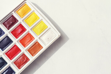 Beautiful bright watercolor paints on light background