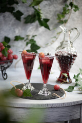 Grape juice in a glass on the table.