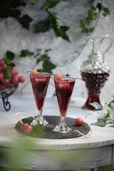 Grape juice in a glass on the table.