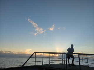 person watching sunset