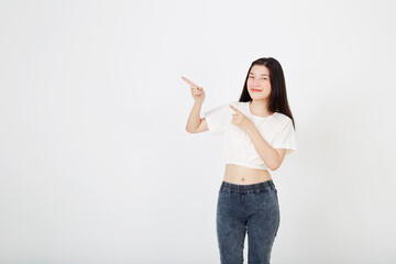 Asian woman pointing shows something