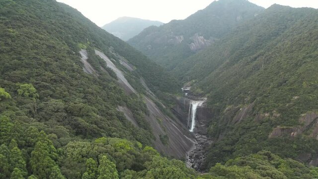 Aerial reveal of Senpiro Waterfall of Yakushima Island, Kagoshima Japan