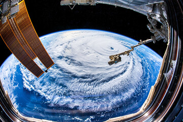 A huge hurricane is seen from the International Space Station. Digital enhancement by the artist. Elements of this image furnished by NASA