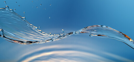 Water Stream splash on gradient background macro shot