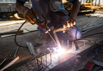 welder at work in factory