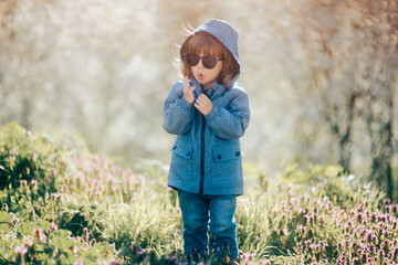 Trendy Toddler Child Wearing Sunglasses in Fashion Portrait © nicoletaionescu