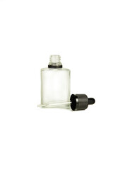 A bottle with a pipette, isolated on a white background. glass container for cosmetic skin care products. Aromatherapy, essence, or perfume is empty. a bottle of cosmetic dropper.