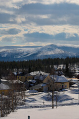 Gallivare, Sweden A view of residential houses and snow-capped mountains