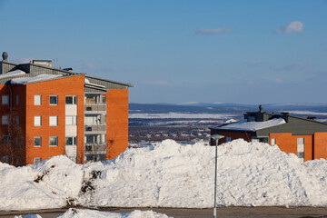 Kiruna, Sweden,  A residential neighbourhood in the spring with piles of snow.