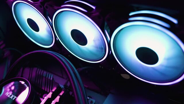 Gaming PC rig with liquid cooling setup and full RGB light inside 