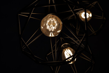 Low light shot on lamp decorations in a room with dark ambience.