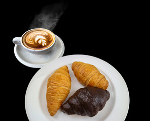 Three freshly baked butter croissant with hot Coffee in porcelain cup and aroma stream in cafe ,