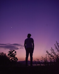 silhouette of a person enjoying sunset