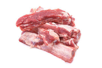 Raw pork ribs are isolated on a white background.