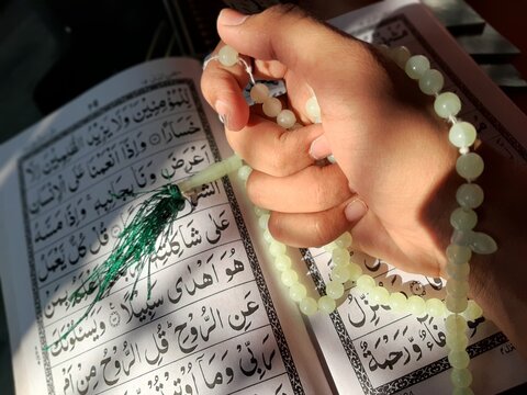 worship in ramadan / ramzan with tasbih and quran is how muslim pray in islam for allah