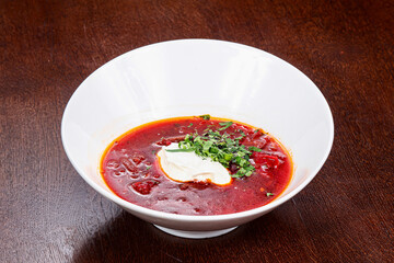 Russian traditional borsch soup with sour cream