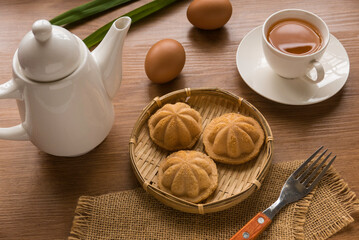 Kueh Bolu or Kuih Bahulu is the Asian traditional food popular in Malaysia and Indonesia.It is a sponge cake baked in special aluminum molds. Serve with a cup of tea.