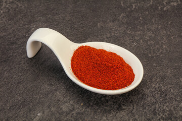 Dry paprika powder in the bowl