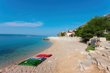Naklejka premium Pisak is a small tourist village located on the Omish Riviera. Dalmatia, Croatia