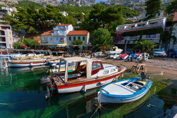 Fototapeta na wymiar Pisak is a small tourist village located on the Omish Riviera. Dalmatia, Croatia