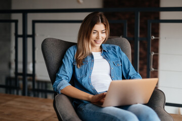 Progressive young woman working remotely from home