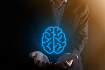 Businessman holding abstract brain and icon tools, device, customer network connection...