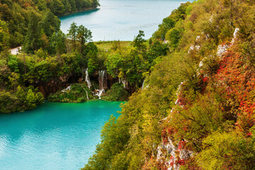 Plitvice Lakes National Park is a colorful landscape with turquoise-blue water in Croatia