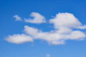 Naklejka na ściany i meble texture or background of a cloud in a blue sky