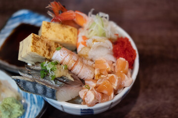 Kaisen-dong is a seafood covered rice topped with seafood and raw fish