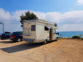 caravan trailer car by the sea in summer holidays