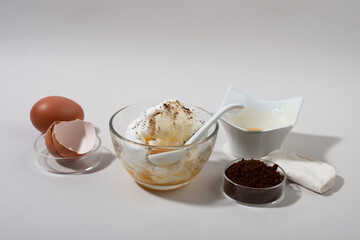 Egg White Face Mask ingredients. Whipped egg white, honey, coffee grounds.