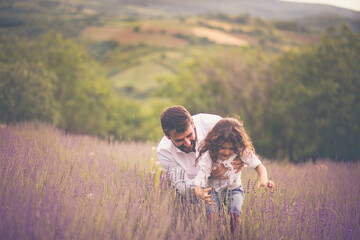 Father and son on lavender field.