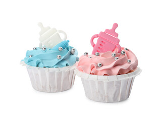 Baby shower cupcakes with light blue and pink cream on white background
