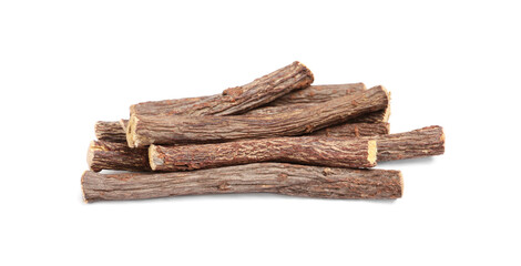 Dried sticks of liquorice root on white background