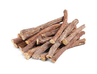 Dried sticks of liquorice root on white background